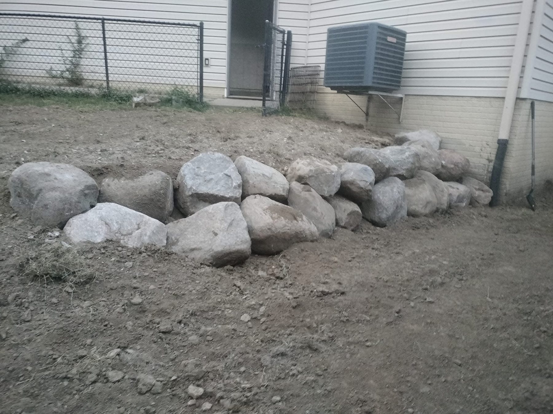 Natural boulder retaining wall